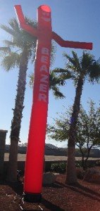 red color inflatable advertising man with lettering